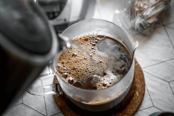 Adding hot water to your coffee, and making a great cup. 